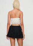 Low-rise mini skirt with ruffle detail Good stretch, fully lined