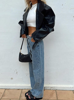 back view of model wearing Princess Polly Pemberton Jeans Mid Wash Denim Petite Mid Rise 