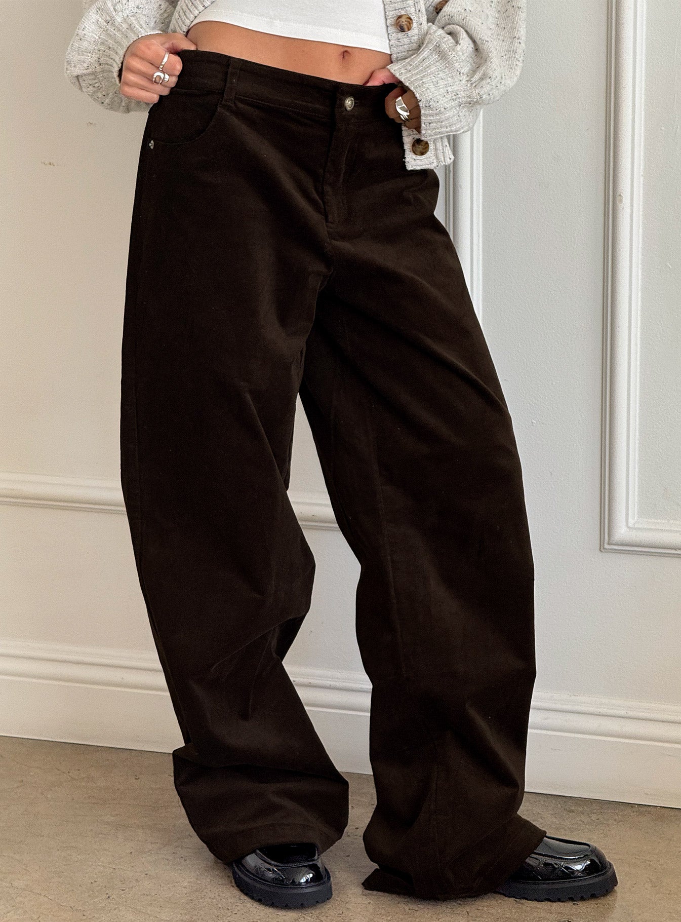 side view of model wearing Princess Polly Kenza Wide Leg Corduroy Pant Brown Mid Rise Pants 