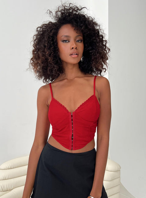 front view of model wearing Princess Polly Palisade Corset Top Red Glitter Sleeveless V-Neck 