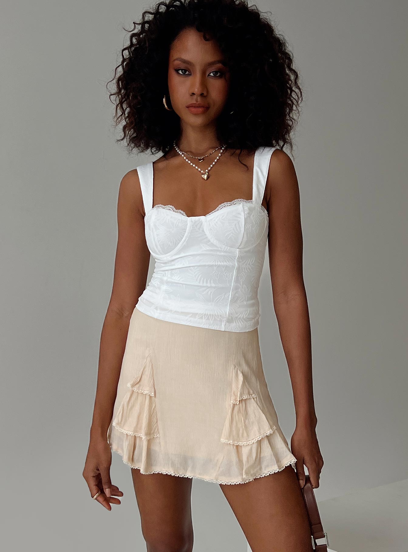   front view of model wearing Princess Polly Foalie Ruffle Mini Skirt Beige Mini Skirts 
