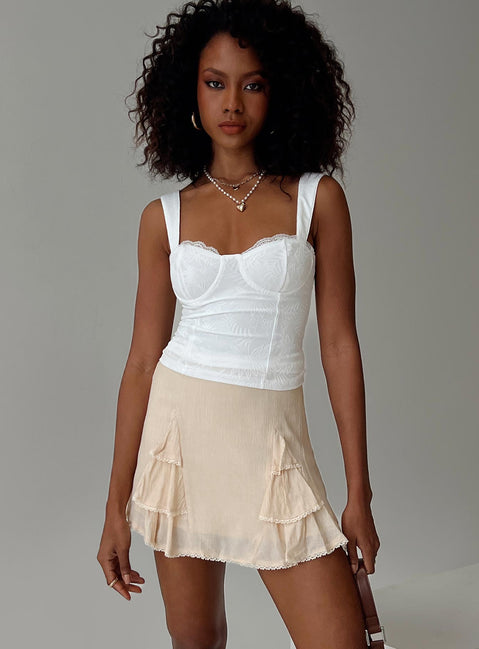   front view of model wearing Princess Polly Foalie Ruffle Mini Skirt Beige Mini Skirts 