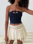 back view of model wearing Princess Polly Ayra Lace Mini Skirt Cream Petite Mini Skirts 