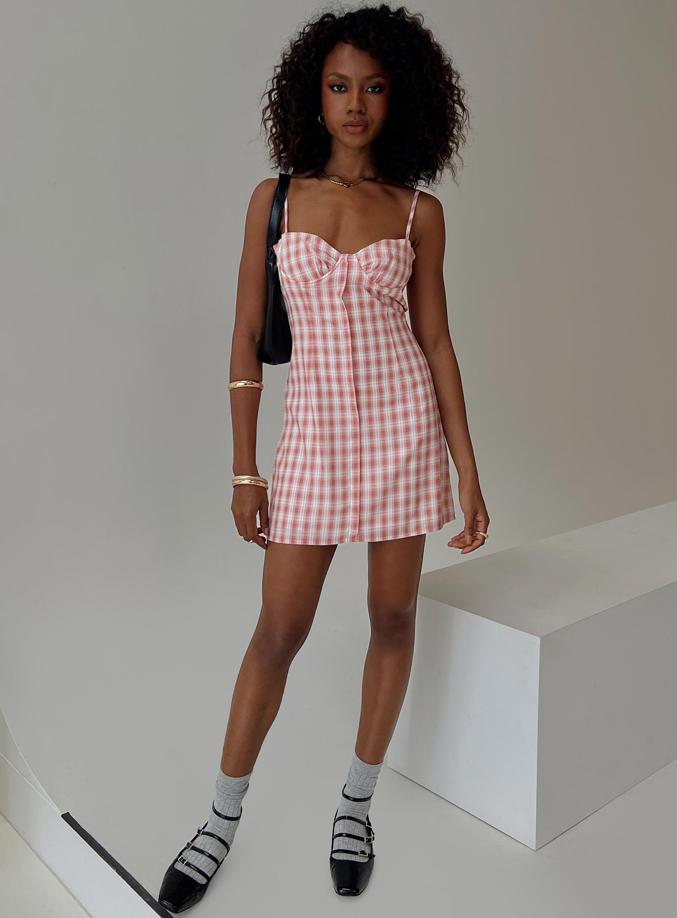 front view of model wearing Princess Polly Poto Mini Dress Pink Check Sweetheart Neckline 