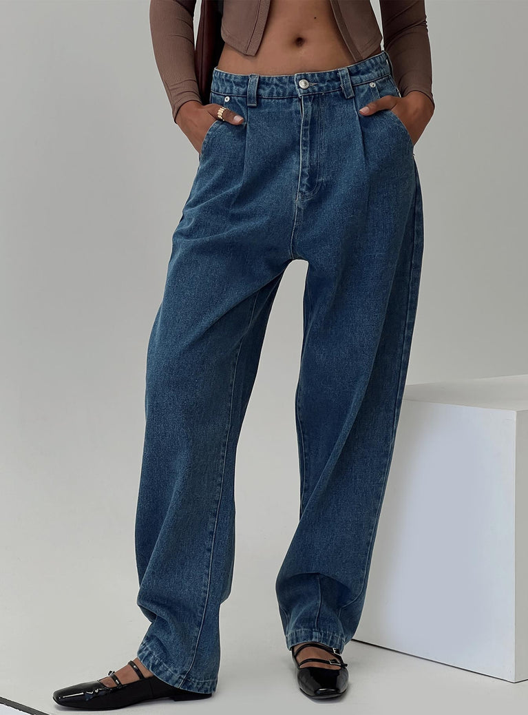 front view of model wearing Princess Polly Forestier Pin Tuck Jeans Mid Blue High Waisted 