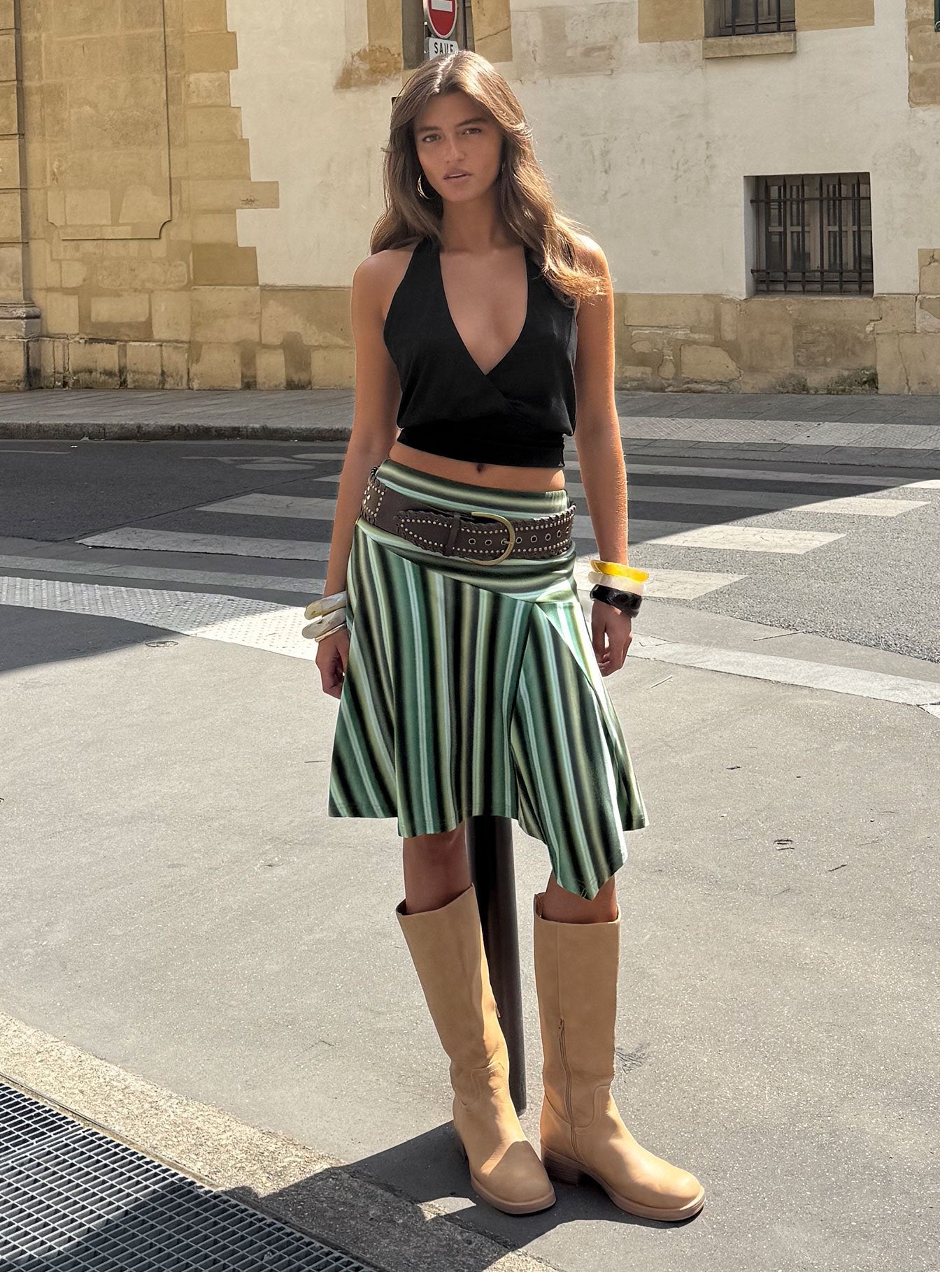 Showcasing the Desidera Asymmetrical Midi Skirt Blue Multi Stripe in womens-skirts with flared fitted design front view of model wearing Princess Polly