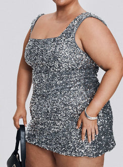 back view of model wearing Princess Polly Miss Me Sequin Mini Dress Silver Curve Square Neck 