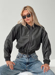 Faux Leather Jacket  Drop shoulder, ribbed collar, cuff & hem, twin hip pockets with clasp fastening  Zip fastening at front 