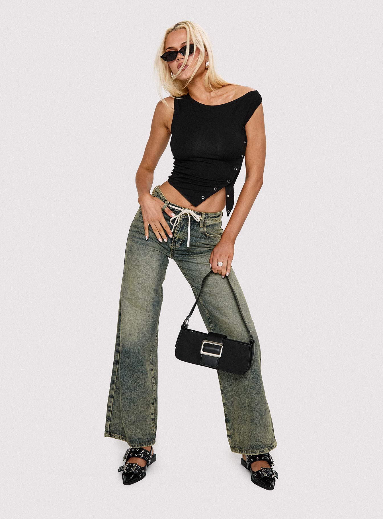 front view of model wearing Princess Polly Mellowed Out Slouchy Jeans Antique Wash Mid Rise 