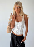 White corset top Sheer lace material Square neckline Hook and eye fastening at front Good stretch Mesh lining