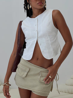 side view of model wearing Princess Polly Aguilera Top White Sleeveless Crew Neck 