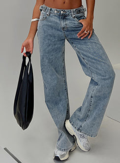 back view of model wearing Princess Polly Sidle Low Rise Jeans Light Wash Low Rise Jeans 