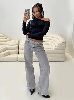 side view of model wearing Princess Polly Scheana Low Rise Jeans Steel Grey Mid Rise 