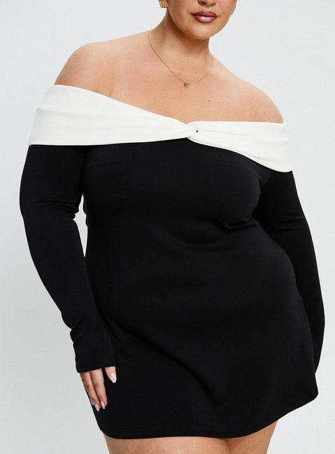 back view of model wearing Princess Polly Distractions Off The Shoulder Mini Dress Multi Curve High Neck 