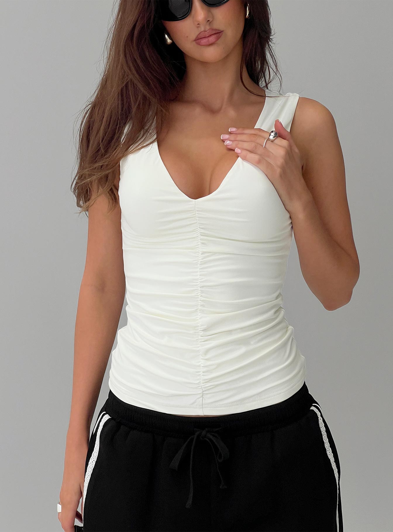 front view of model wearing Princess Polly Loving Is Easy Ruched Top White Sleeveless V-Neck 