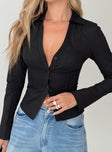 front view of model wearing Princess Polly Zifa Shirt Black Full Sleeves V-Neck 