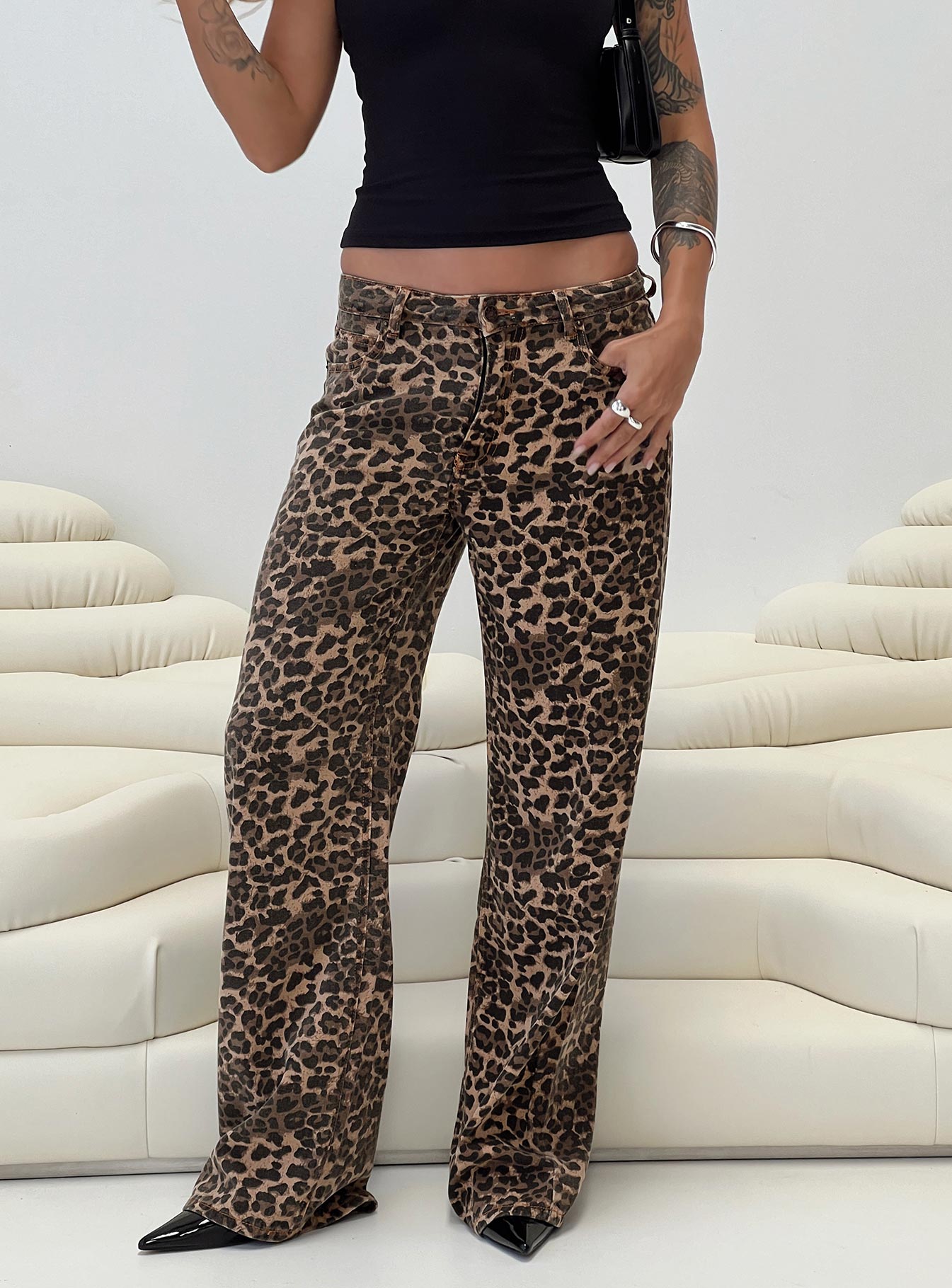back view of model wearing Princess Polly Top Model Jeans Leopard High Waisted 