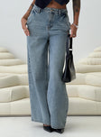 front view of model wearing Princess Polly Jewelz Wide Leg Jeans Light Wash Mid Rise 