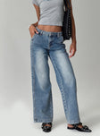 front view of model wearing Princess Polly Skipper Low Rise Baggy Jeans Vintage Blue Low Rise Jeans 