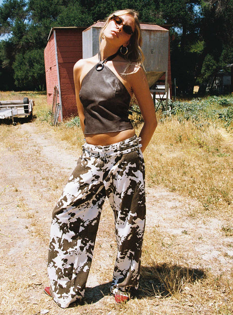 front view of model wearing Princess Polly Baccarat Belted Pant Cow Print Low Rise Jeans 