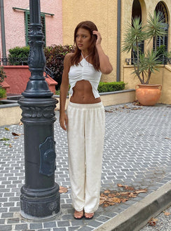 side view of model wearing Princess Polly Louis Linen Blend Pants White Petite 