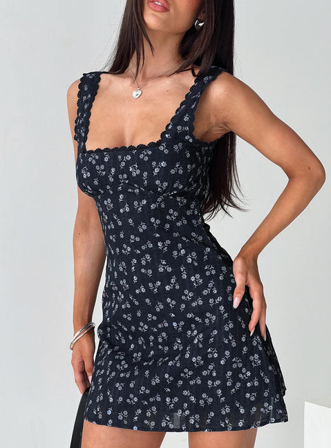 front view of model wearing Princess Polly Dasha Mini Dress Navy Floral Square Neck 
