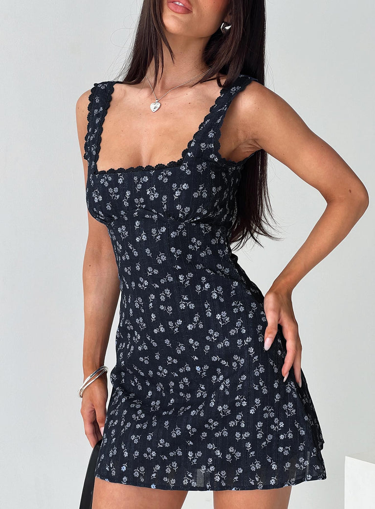 front view of model wearing Princess Polly Dasha Mini Dress Navy Floral Square Neck 