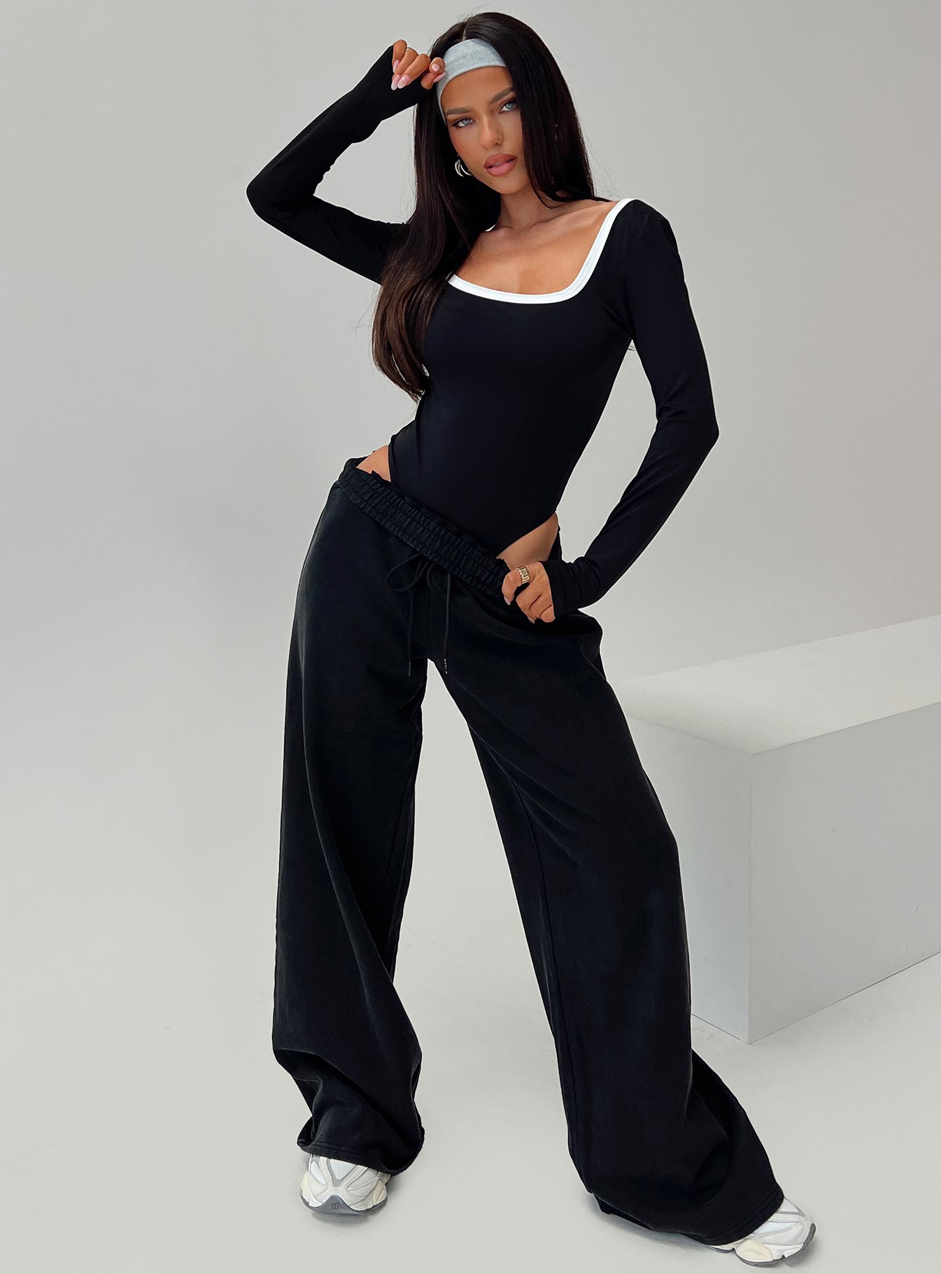 front view of model wearing Princess Polly Ender Contrast Trim Bodysuit Black Long Sleeve Tops 