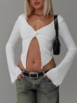 front view of model wearing Princess Polly Holli Long Sleeve Twist Top White Full Sleeves Plunger 