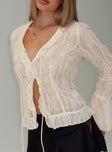 back view of model wearing Princess Polly Sainz Frill Long Sleeve Top Cream Full Sleeves V-Neck 