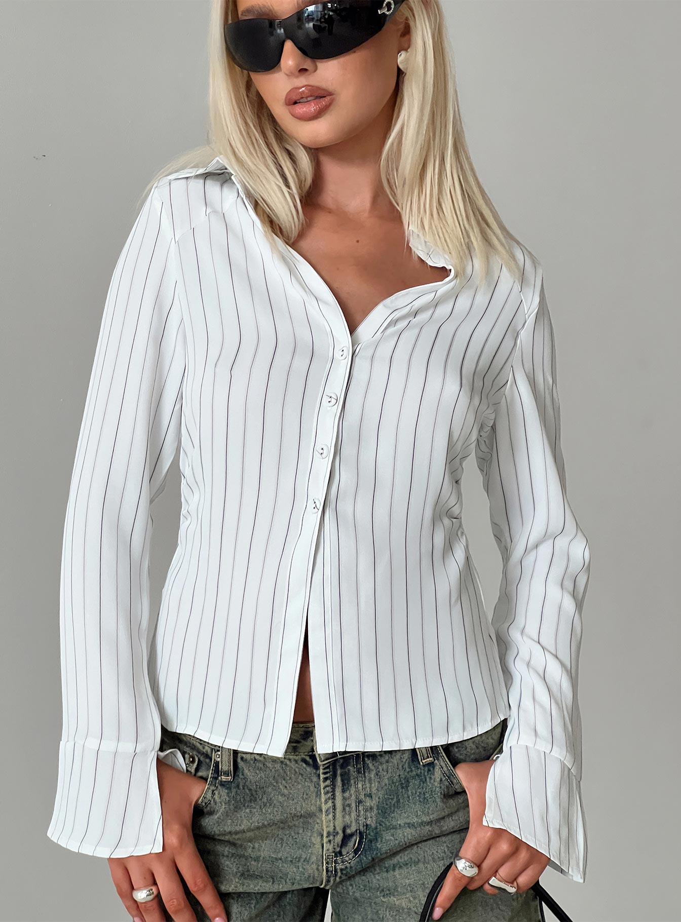 front view of model wearing Princess Polly Aldgate Long Sleeve Top White Full Sleeves V-Neck 
