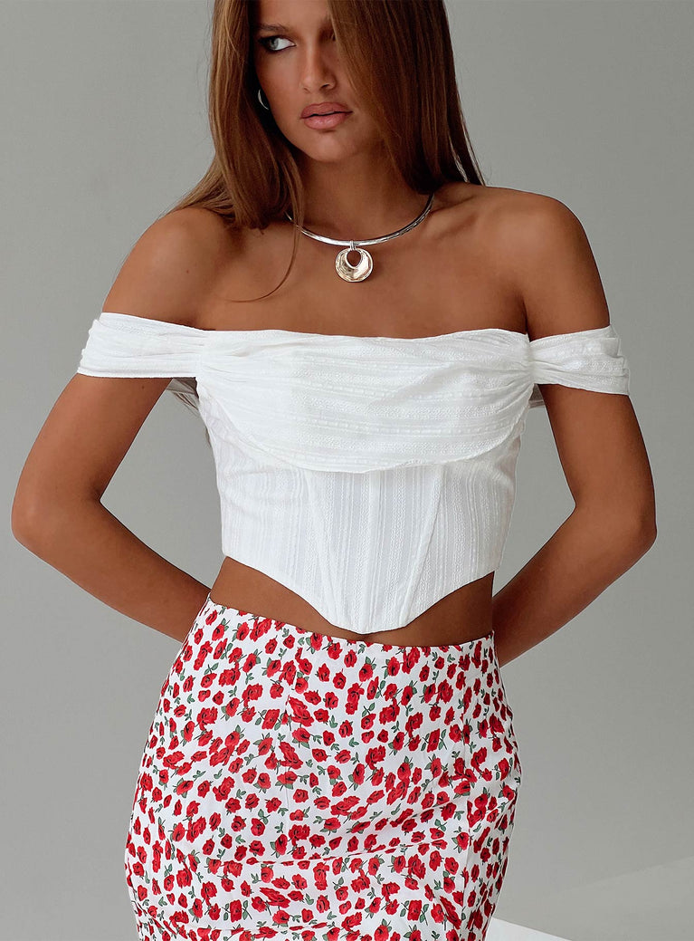 White off the shoulder crop top Inner silicone strip at bust, boning throughout, zip fastening at back, curved hem