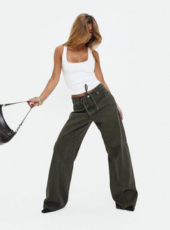 back view of model wearing Princess Polly Bruiser Tie Waist Mid Rise Wide Leg Jeans Green Petite High Rise Jeans 