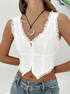 Front view of model wearing  front Princess Polly Sleeveless V-Neck  Silvanna Top White