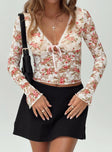 Long sleeve floral lace top V-neckline, ribbon detail, flared cuff Good stretch, lined bust
