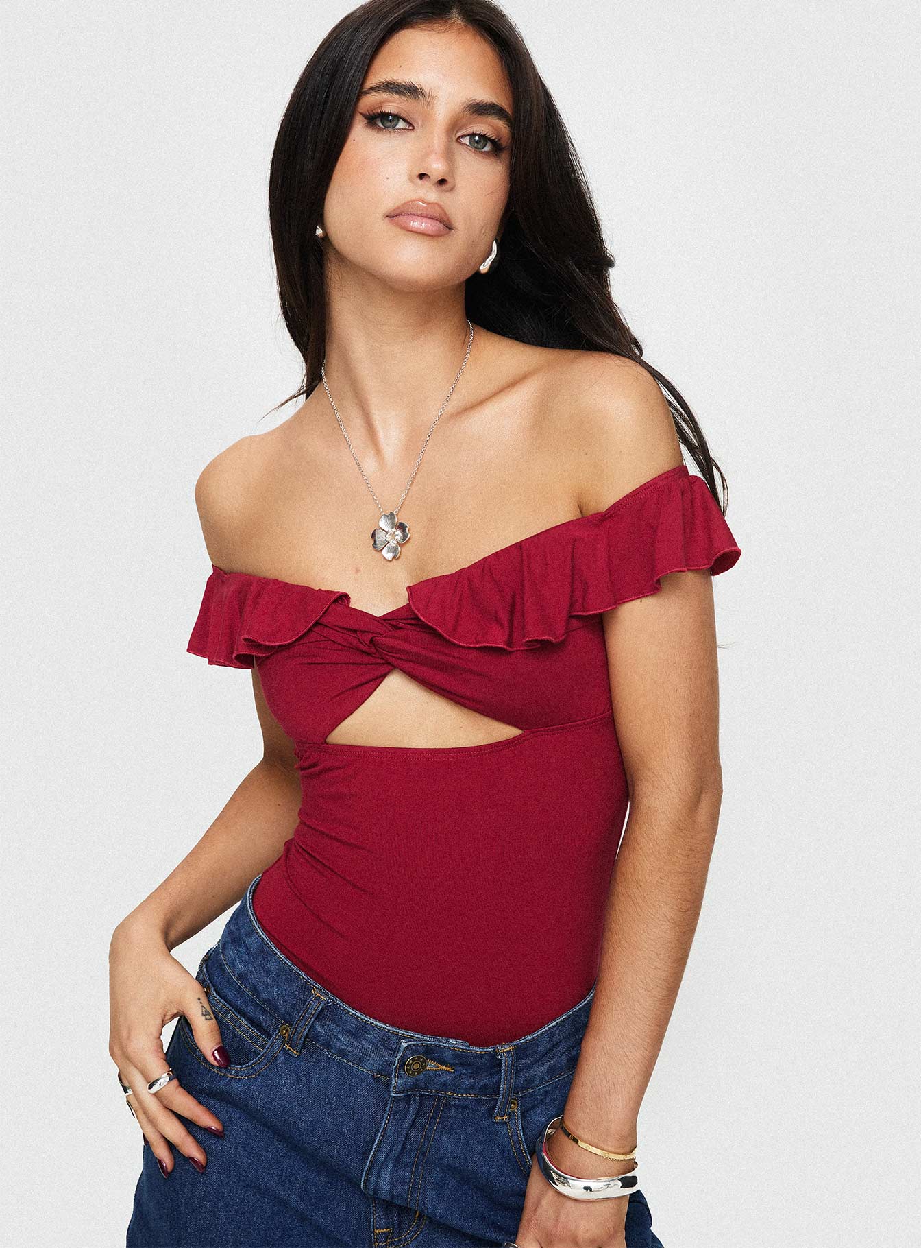 side view of model wearing Princess Polly Be Careful Off The Shoulder Bodysuit Red Short Sleeves V-Neck 