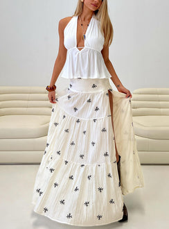   front view of model wearing Princess Polly Cinnamon Embroidered Maxi Skirt Cream / Navy Maxi 