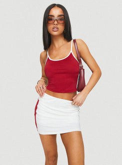 front view of model wearing Princess Polly Tex Skort White / Red 