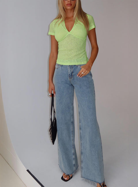 front view of model wearing Princess Polly Darla Low Rise Straight Jean Vintage Blue Wash Low Rise Jeans 