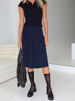   side view of model wearing Princess Polly Elaila Pleat Midi Skirt Navy Midi Skirts 