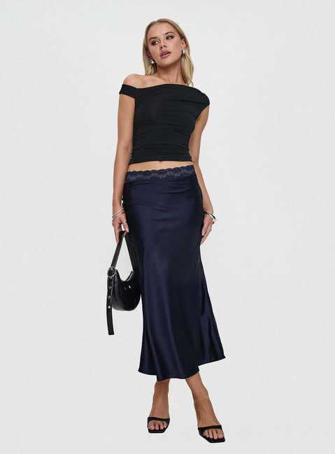   side view of model wearing Princess Polly The Charmaine Maxi Skirt Navy Midi Skirts 