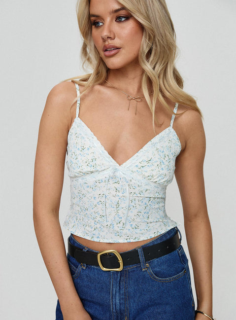 side view of model wearing Princess Polly Fondar Top Multi Floral Sleeveless Plunger 