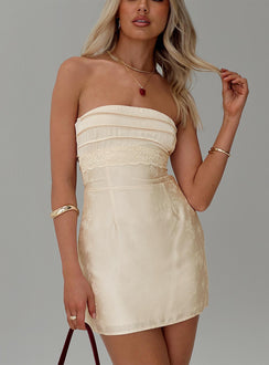 front view of model wearing Princess Polly Busiate Strapless Mini Dress Champagne Straight Neck 