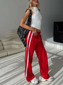 front view of model wearing Princess Polly Keli Track Pants Red / White High Waisted Pants 