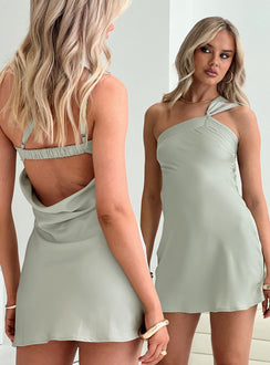 back view of model wearing Princess Polly Marziani Mini Dress Sage Asymmetric Neckline 