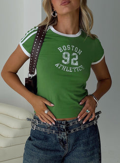 front view of model wearing Princess Polly Boston Athletics Top Green Short Sleeves Crew Neck 