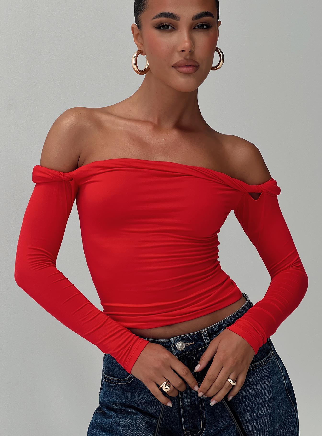 front view of model wearing Princess Polly Dusky Long Sleeve Top Red Full Sleeves straight 