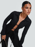 front view of model wearing Princess Polly Nataline Long Sleeve Top Black Full Sleeves Plunger 