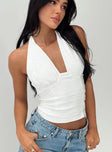 Halter neck top Twist bust tie fastening at back of neck, invisible zip fastening at side Good stretch, fully lined