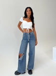 Front view of model wearing  front Princess Polly Mid Rise  Livvy Jeans Mid Wash Denim